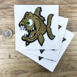 Large angry fish stickers in gold from Pyranha Kayaks