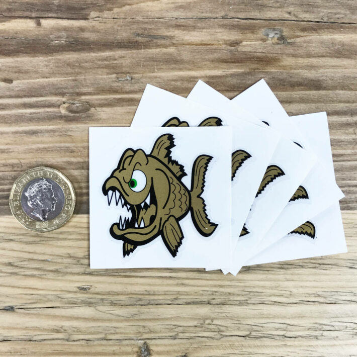 Small angry fish stickers in gold from Pyranha Kayaks