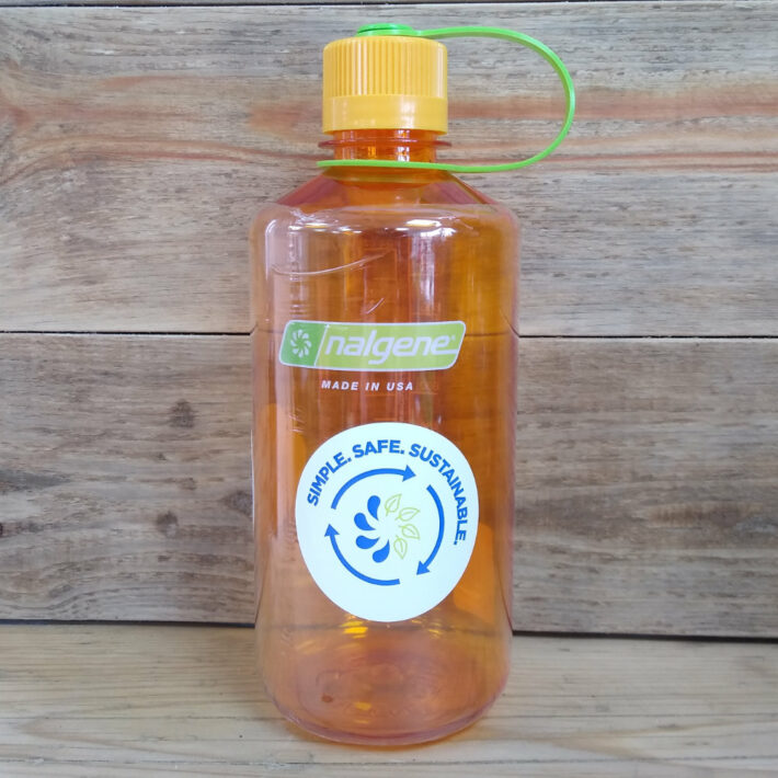 A narrow mouth 1 litre nalgene bottle in colour clementine