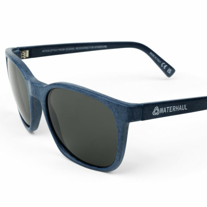 Waterhaul Fitzroy sunglasses with polarised grey lens. Logo focus.