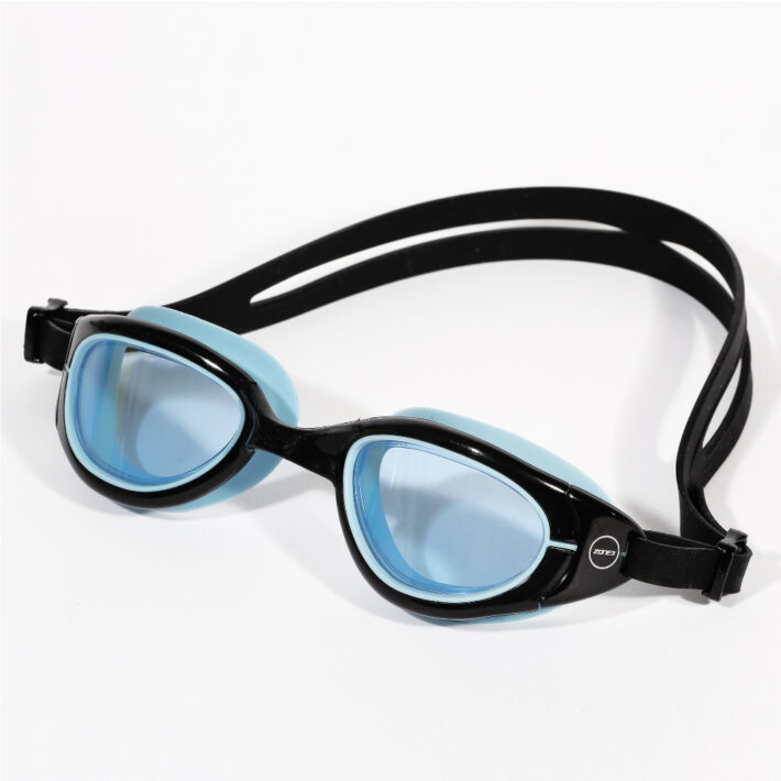 Black zone 3 swimming goggles with blue accent colour around the seal around the eyes.