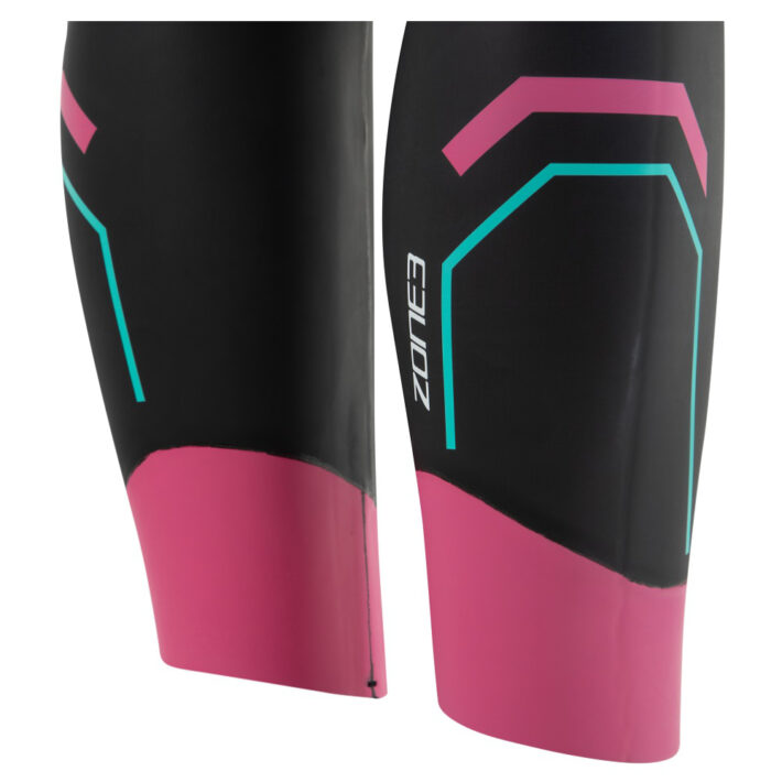 Woman's Agile Wetsuit, Colour: Black and Pink with Teal Detailing, Off centre front image of lower leg.