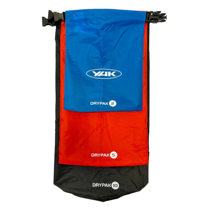 Yak lightweight Dry Bag Set, 10L, 5L, 2L, blue, red, grey, all stacked on top of eachover